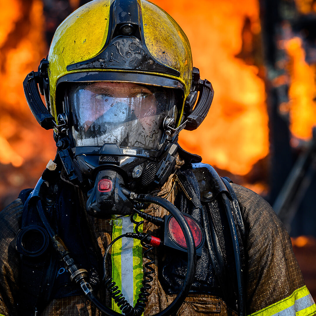 Firefighters trying to put out flames cabin on fire