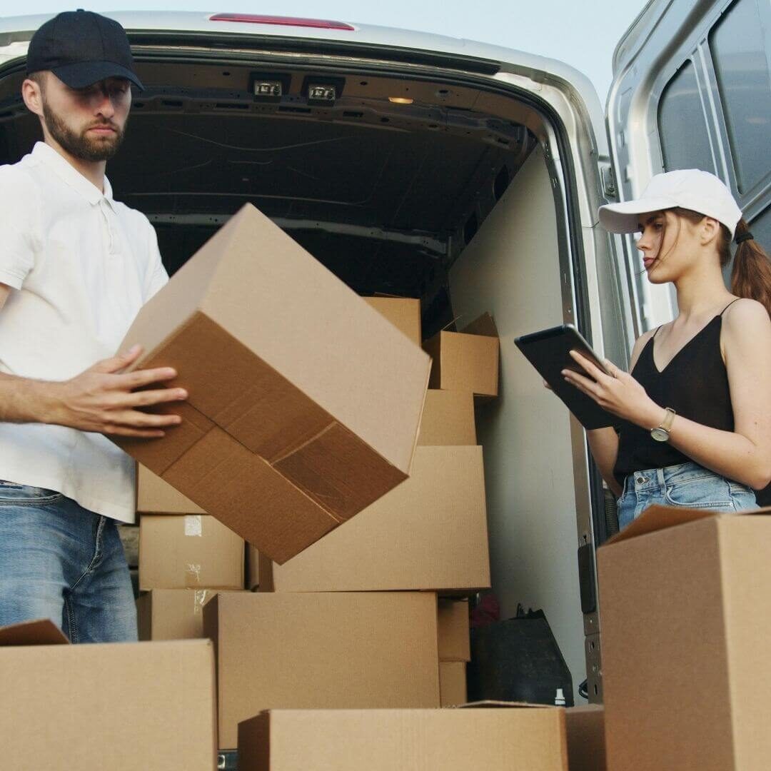 moving company unpacking a van