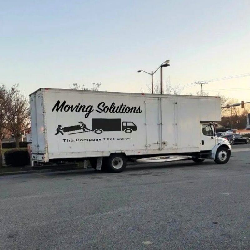 Moving Solutions truck parked