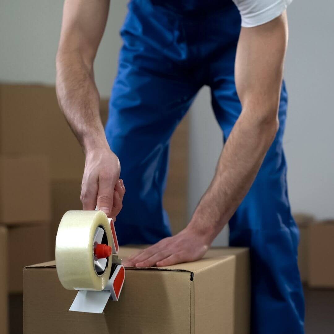 mover taking up a box
